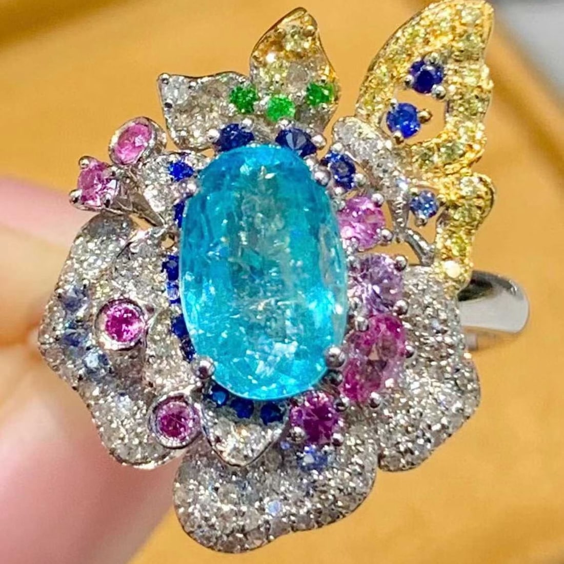 14k Gold 1.44 Ct Natural Paraiba Tourmaline & Diamond Ring: Ref:231155166 // gold content:14k gold // ring size:7. 25us // // main gemstone:paraiba tourmaline // shape:oval // carat weight:1. 44ct // color:blue // treatment:natural // // adjacent gemstone 2 :