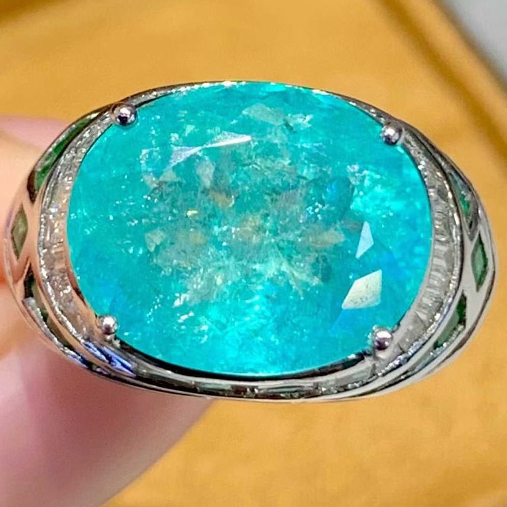 14k Gold 6.88 Ct Natural Paraiba Tourmaline & Diamond Ring: Ref:231155205 // gold content:14k gold // ring size:7. 25us // // main gemstone:paraiba tourmaline // shape:oval // carat weight:6. 88ct // color:blue // treatment:natural // // adjacent gemstone 2 : 