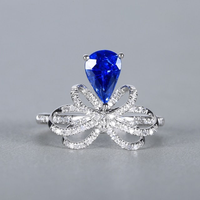 14k Gold 1.62 Ctw Natural Sapphire & Diamond Ring: Ref:231156012 // gold content:14k gold // ring size:7. 25us // // main gemstone:sapphire // shape:pear // carat weight:1. 38ct // color:blue // treatment:natural // // adjacent gemstone 2 : diamond //