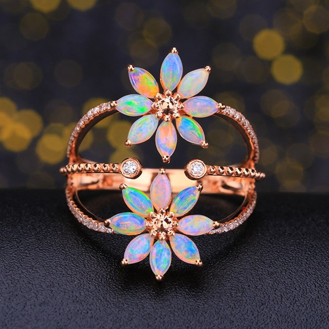 14k Gold 1.03 Ctw Natural Opal & Diamond Ring: Ref:231156016 // gold content:14k gold // ring size:7. 25us // // main gemstone:opal // shape:marquise // carat weight:0. 83ct // color:color // treatment:natural // // adjacent gemstone 2 : diamond /
