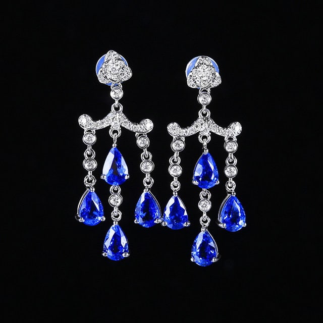 14k Gold 4.47 Ctw Natural Sapphire & Diamond Earrings: Ref:231156019 // gold content:14k gold // main gemstone:sapphire // shape:pear // carat weight:4. 16ct // color:blue // treatment:natural // // adjacent gemstone 2 : diamond // number of stones:58 // 