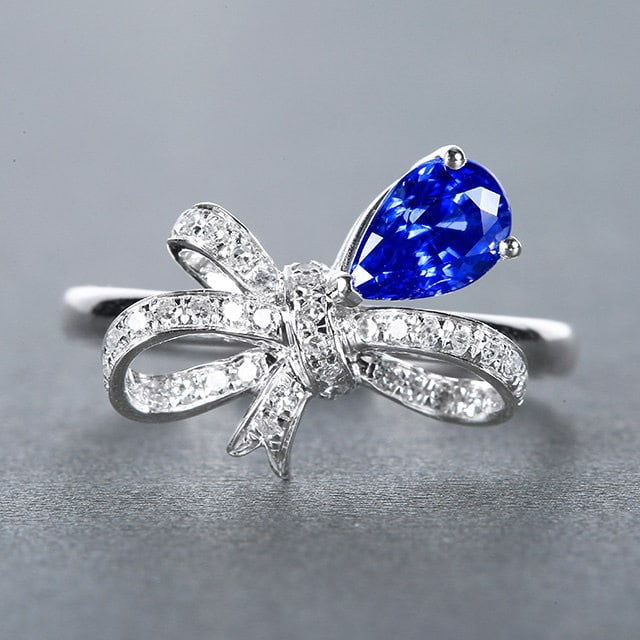 14k Gold 1.26 Ctw Natural Sapphire & Diamond Ring: Ref:231156029 // gold content:14k gold // ring size:7. 25us // // main gemstone:sapphire // shape:pear // carat weight:1. 08ct // color:blue // treatment:natural // // adjacent gemstone 2 : diamond //