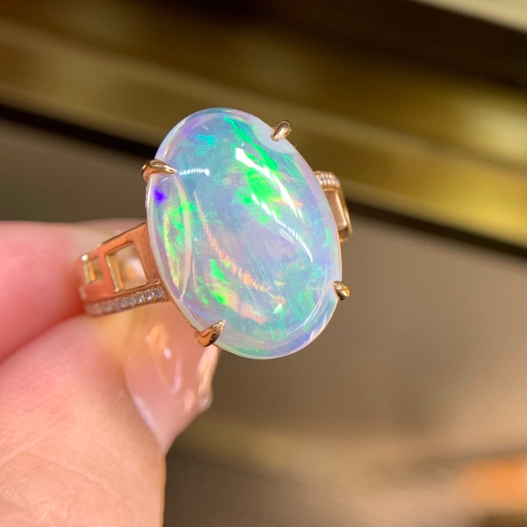 14k Gold 7.1 Ct Natural Opal & Diamond Ring: Ref:231156046 // gold content:14k gold // ring size:7. 25us // // main gemstone:opal // shape:oval // carat weight:7. 1ct // color:color // treatment:natural // // adjacent gemstone 2 : diamond //