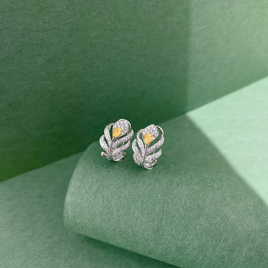 14k Gold 0.65 Ct Natural Color Diamond Earrings: Ref:231156050 // gold content:14k gold // main gemstone:diamond // shape:multiple // carat weight:0. 65ct // clarity grade:vs-si // color:color // treatment:natural // Condition: New Low Estimate: