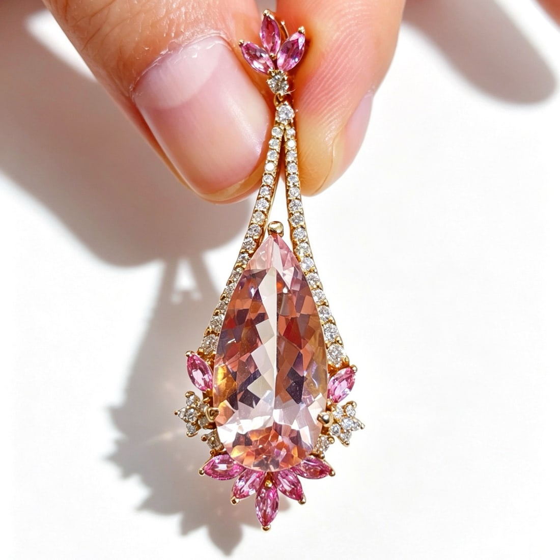 14k Gold 8.95 Ctw Natural Morganite & Sapphire Pendant( Without Chain ): Ref:231156051 // gold content:14k gold // main gemstone:morganite // shape:pear // carat weight:7. 95ct // color:pink // treatment:natural // // adjacent gemstone 2 : sapphire // shape:marquise // car