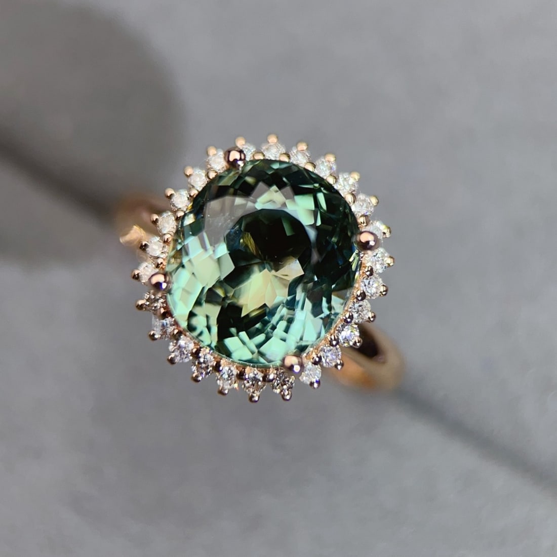 14k Gold 6.04 Ctw Natural Tourmaline & Diamond Ring: Ref:231156065 // gold content:14k gold // ring size:7. 25us // // main gemstone:tourmaline // shape:oval // carat weight:5. 78ct // color:green // treatment:natural // // adjacent gemstone 2 : diamond