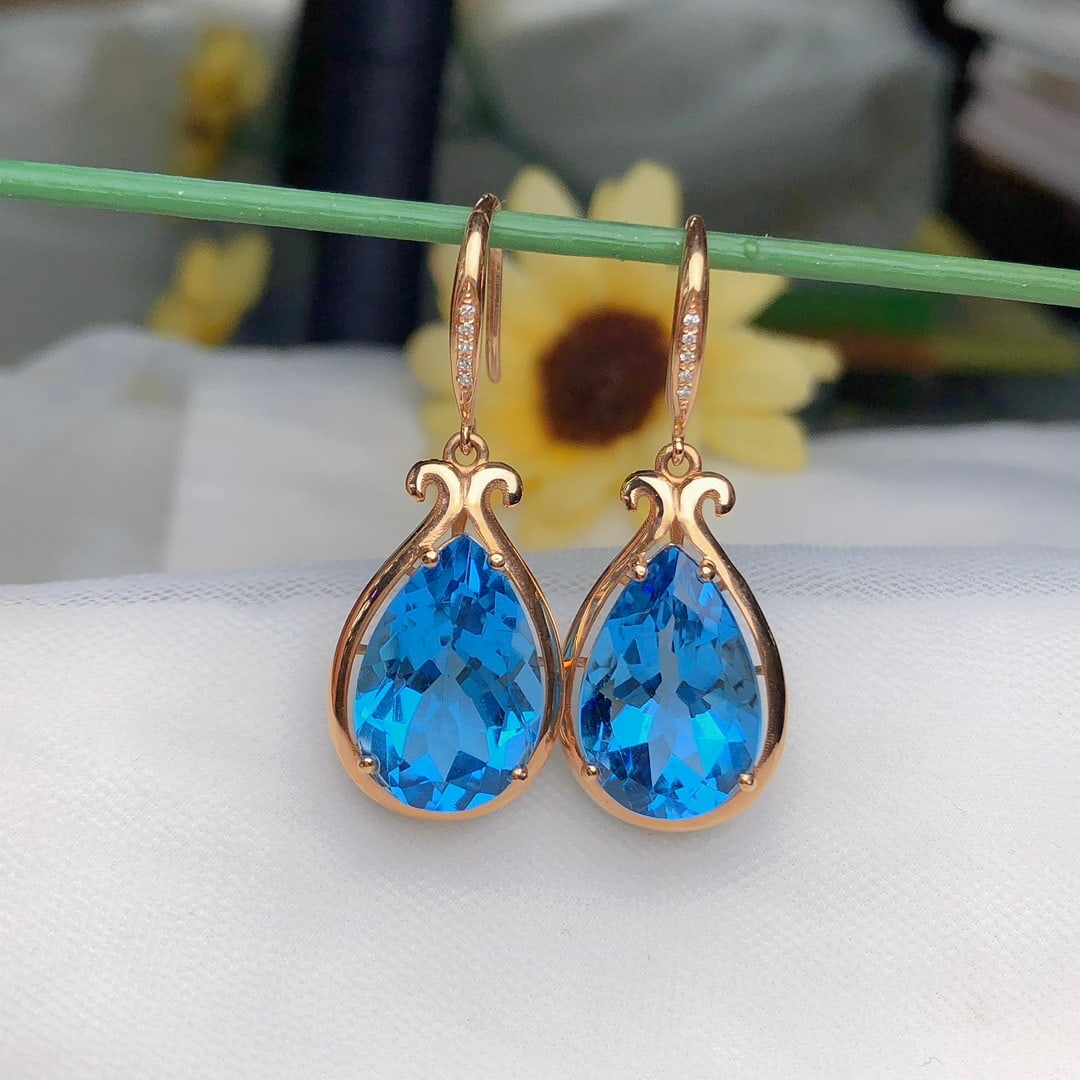14k Gold 13.88 Ct Natural Topaz & Diamond Earrings: Ref:231156108 // gold content:14k gold // main gemstone:topaz // shape:pear // carat weight:13. 88ct // color:blue // treatment:natural // // adjacent gemstone 2 : diamond // number of stones:10 //