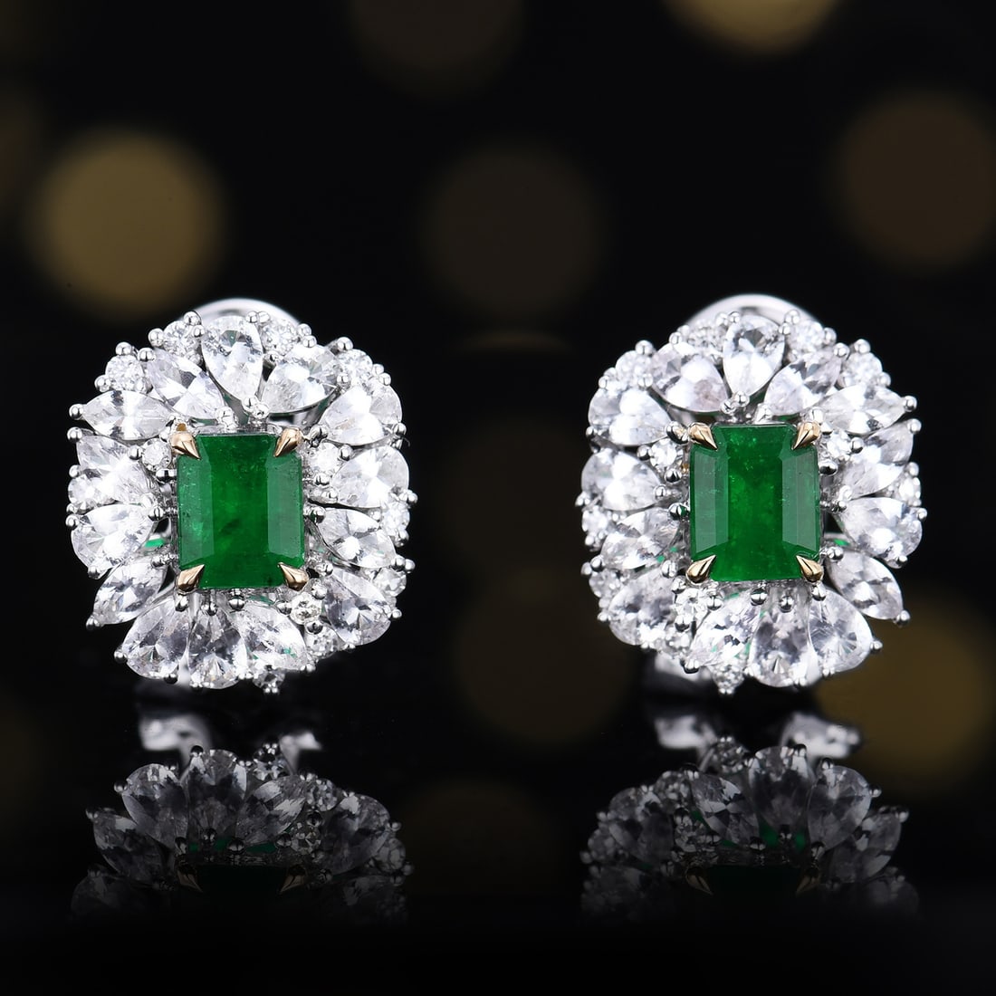 14k Gold 1.94 Ctw Natural Emerald & Sapphire Earrings: Ref:231156124 // gold content:14k gold // main gemstone:emerald // shape:octagonal // carat weight:0. 7ct // color:green // treatment:natural // // adjacent gemstone 2 : sapphire // number of stones:2