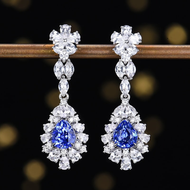 14k Gold 3.52 Ctw Natural Sapphire & Diamond Earrings: Ref:231156126 // gold content:14k gold // main gemstone:sapphire // shape:pear // carat weight:1. 58ct // color:blue // treatment:natural // // adjacent gemstone 2 : diamond // number of stones:20 // 
