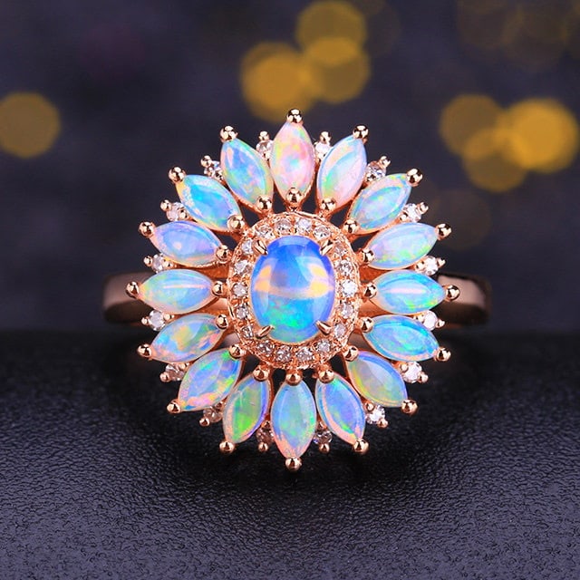 14k Gold 1.25 Ctw Natural Opal & Diamond Ring: Ref:231156233 // gold content:14k gold // ring size:7. 25us // // main gemstone:opal // shape:multiple // carat weight:1. 12ct // color:color // treatment:natural // // adjacent gemstone 2 : diamond /