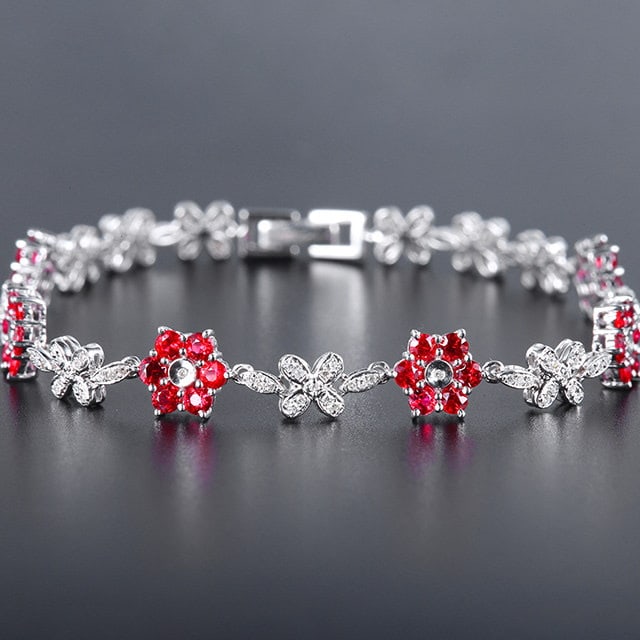 14k Gold 2.86 Ctw Natural Ruby & Diamond Bracelet: Ref:231156248 // gold content:14k gold // main gemstone:ruby // shape:round // carat weight:2. 4ct // color:red // treatment:natural // cut grade:g // // adjacent gemstone 2 : diamond // number of