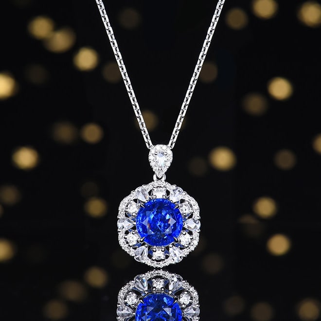 14k Gold 3.29 Ctw Natural Sapphire & Diamond Pendant( Without Chain ): Ref:231156257 // gold content:14k gold // main gemstone:sapphire // shape:oval // carat weight:2. 7ct // color:blue // treatment:natural // // adjacent gemstone 2 : diamond // number of stones:48 //