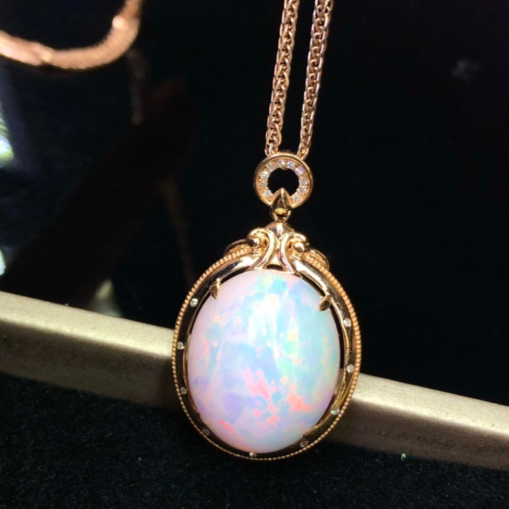 14k Gold 12.85 Ct Natural Opal & Diamond Pendant( Without Chain ): Ref:231156283 // gold content:14k gold // main gemstone:opal // shape:oval // carat weight:12. 85ct // color:color // treatment:natural // // adjacent gemstone 2 : diamond // number of stones:19 // sh