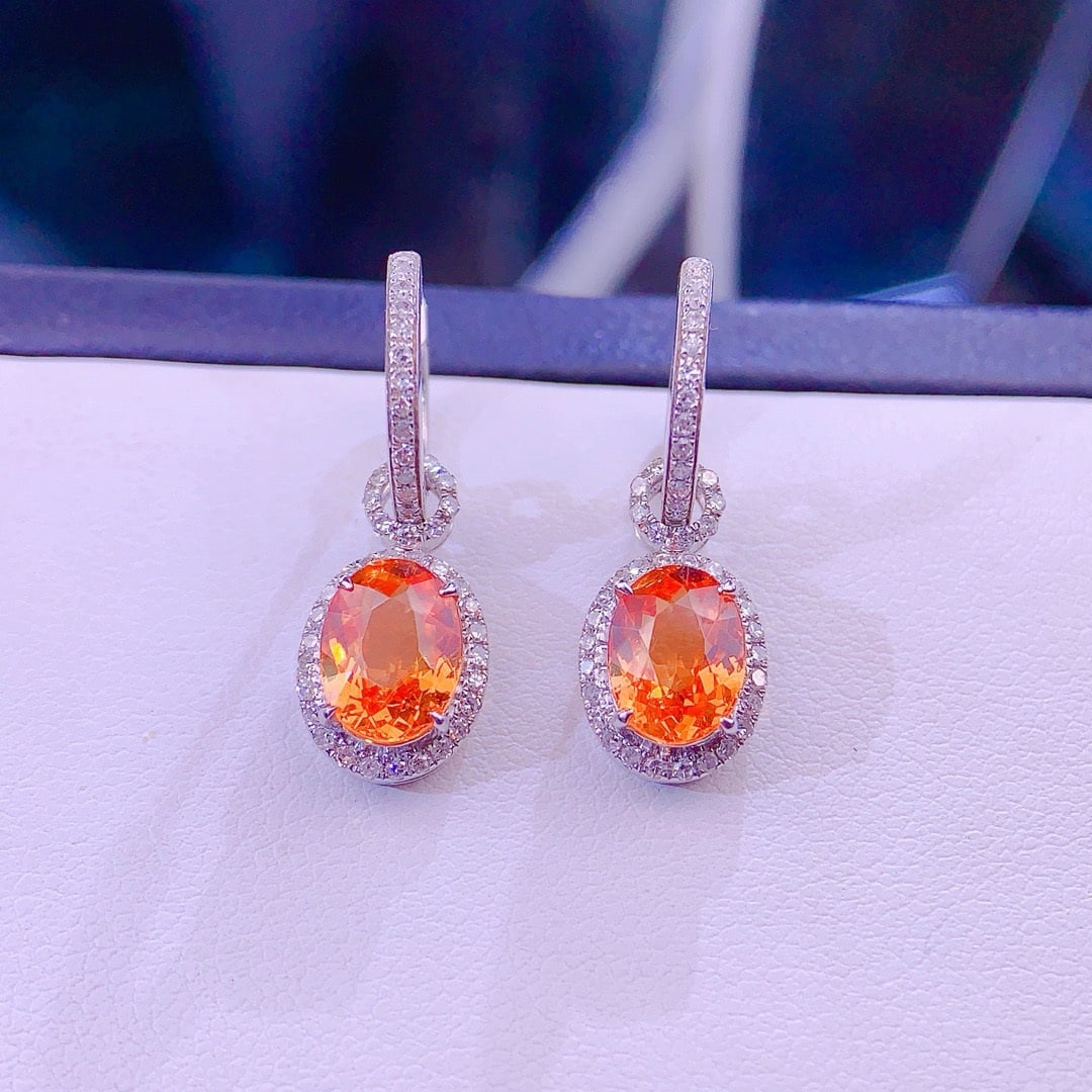 14k Gold 4 Ct Natural Spessartine & Diamond Earrings: Ref:231156326 // gold content:14k gold // main gemstone:spessartine // shape:oval // carat weight:4ct // color:orange // treatment:natural // // adjacent gemstone 2 : diamond // shape:round // clarity