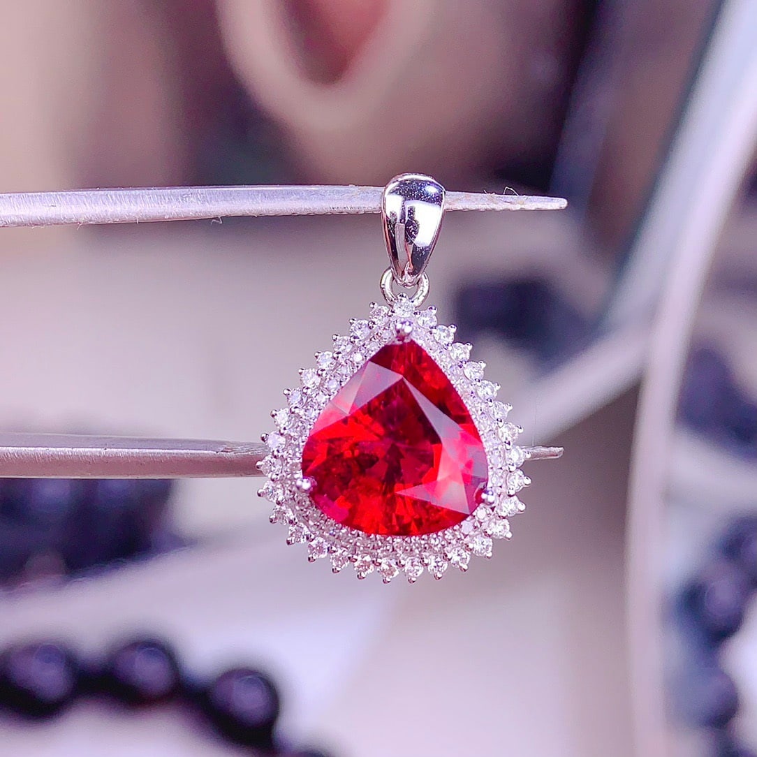 14k Gold 3.3 Ct Natural Tourmaline & Diamond Pendant( Without Chain ): Ref:231156373 // gold content:14k gold // main gemstone:tourmaline // shape:pear // carat weight:3. 3ct // color:red // treatment:natural // // adjacent gemstone 2 : diamond // shape:round // clarity 