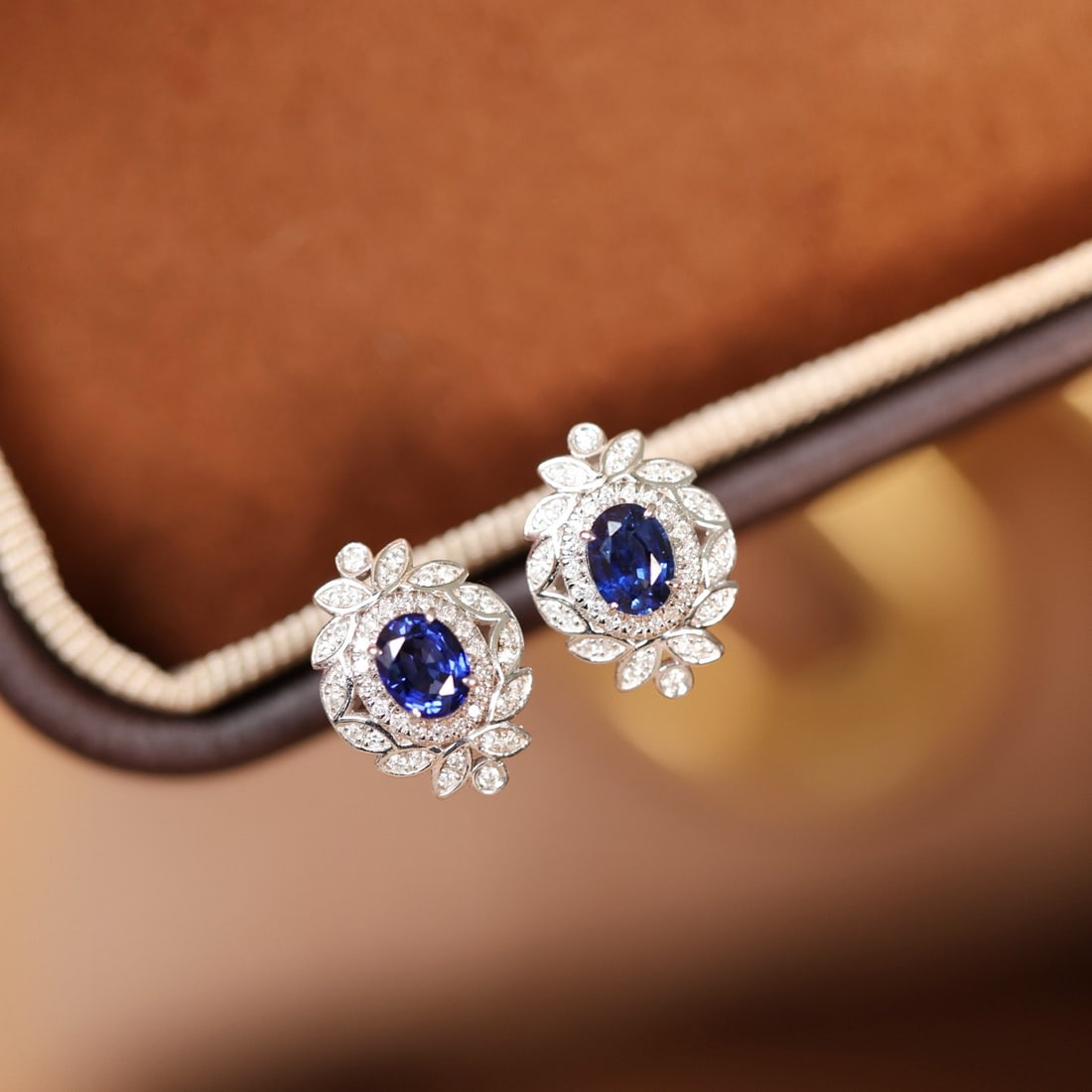 14k Gold 0.92 Ctw Natural Sapphire & Diamond Earrings: Ref:231156389 // gold content:14k gold // main gemstone:sapphire // shape:oval // carat weight:0. 7ct // color:blue // treatment:natural // // adjacent gemstone 2 : diamond // shape:round // carat wei