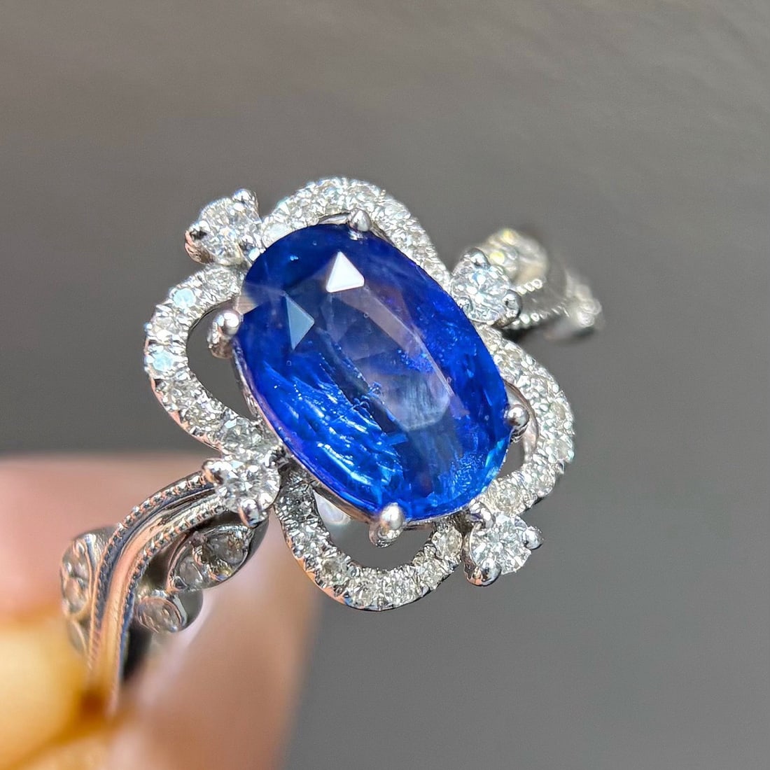 14k Gold 2.40 Ctw Natural Sapphire & Diamond Ring: Ref:231156433 // gold content:14k gold // ring size:7. 25us // // main gemstone:sapphire // shape:oval // carat weight:2. 18ct // color:blue // treatment:natural // // adjacent gemstone 2 : diamond