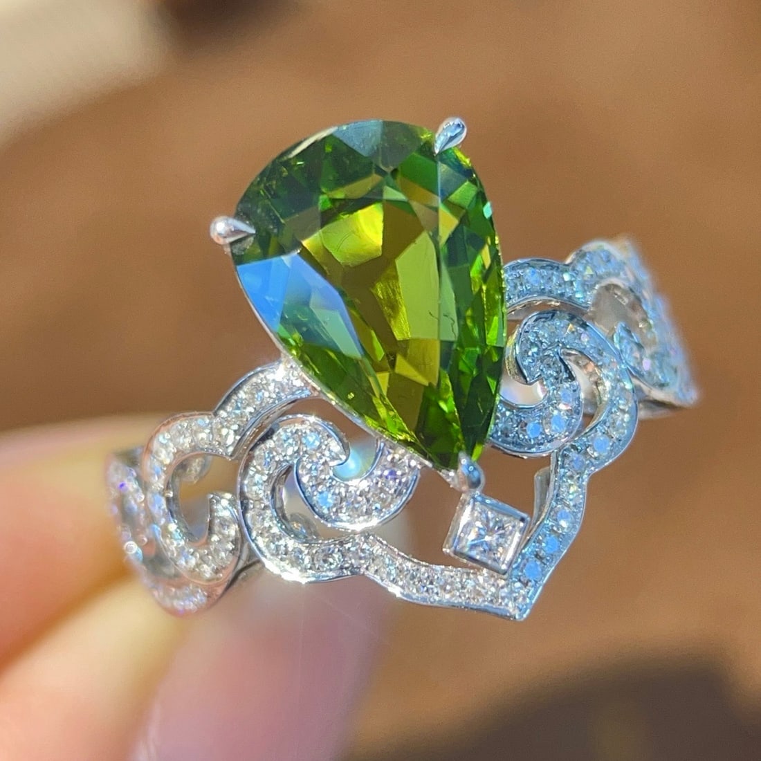 14k Gold 3.99 Ctw Natural Tourmaline & Diamond Ring: Ref:231156435 // gold content:14k gold // ring size:7. 25us // // main gemstone:tourmaline // shape:pear // carat weight:3. 73ct // color:green // treatment:natural // // adjacent gemstone 2 :