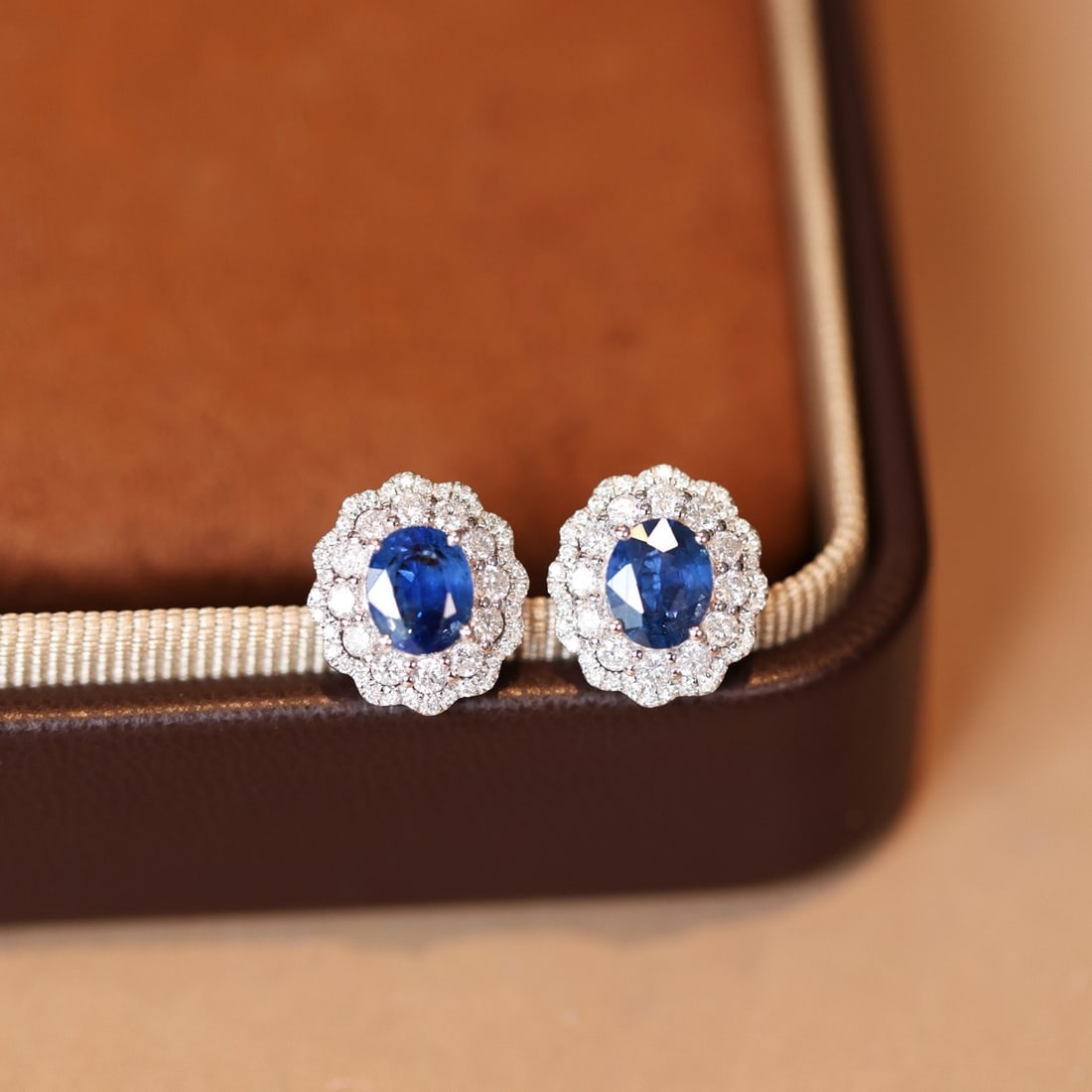 14k Gold 2.05 Ctw Natural Sapphire & Diamond Earrings: Ref:231156439 // gold content:14k gold // main gemstone:sapphire // shape:oval // carat weight:1. 31ct // color:blue // treatment:natural // // adjacent gemstone 2 : diamond // shape:round // carat