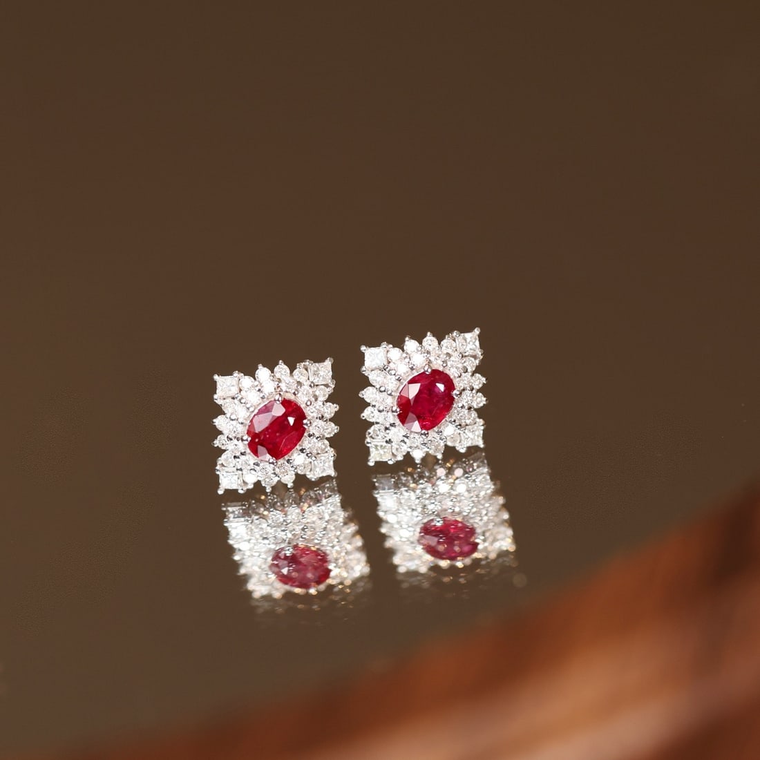 14k Gold 1.30 Ctw Natural Ruby & Diamond Earrings: Ref:231156445 // gold content:14k gold // main gemstone:ruby // shape:oval // carat weight:0. 75ct // color:red // treatment:natural // // adjacent gemstone 2 : diamond // shape:multiple // carat