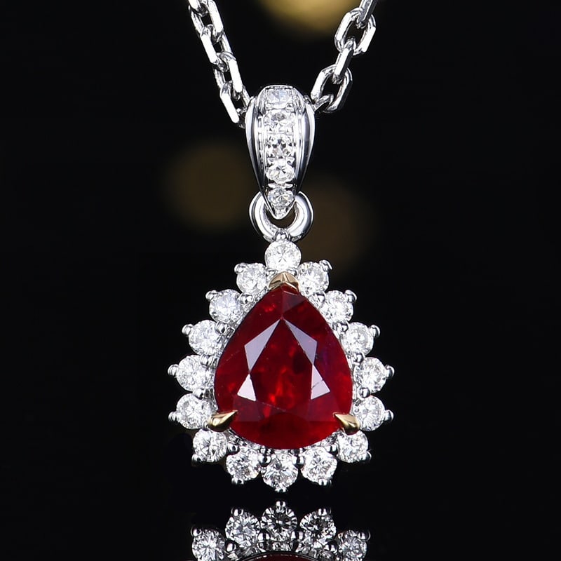 14k Gold 0.93 Ctw Natural Ruby & Diamond Pendant( Without Chain ): Ref:231157028 // gold content:14k gold // main gemstone:ruby // shape:pear // carat weight:0. 75ct // color:red // treatment:natural // // adjacent gemstone 2 : diamond // number of stones:21 //