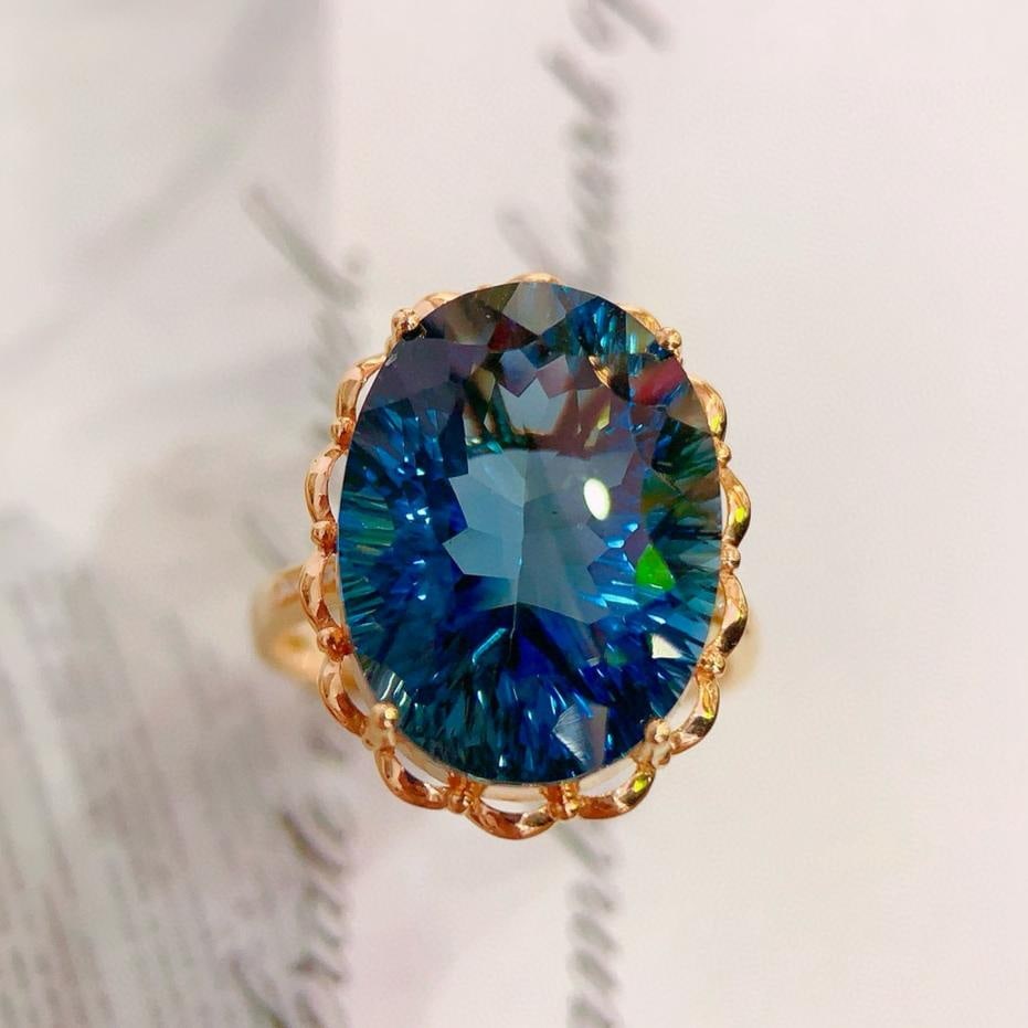 14k Gold 15.98 Ctw Natural Topaz & Diamond Ring: Ref:231157050 // gold content:14k gold // ring size:7. 25us // // main gemstone:topaz // shape:oval // carat weight:15. 95ct // color:blue // treatment:natural // // adjacent gemstone 2 : diamond //