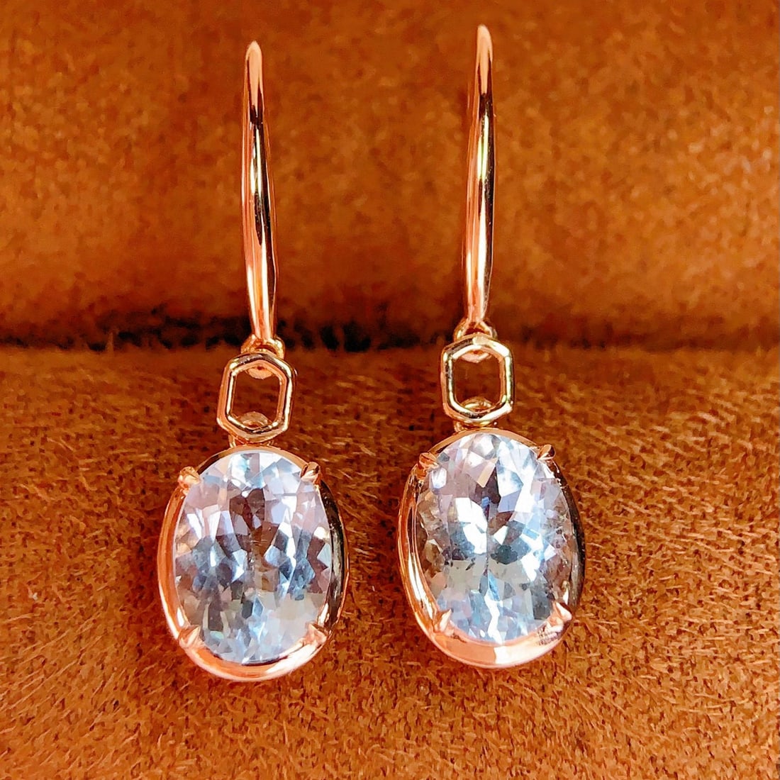 14k Gold 2.2 Ct Natural Aquamarine Earrings: Ref:231157065 // gold content:14k gold // main gemstone:aquamarine // shape:oval // carat weight:2. 2ct // color:blue // treatment:natural // Condition: New Low Estimate: 3300.00 High Estimate: 5000.0