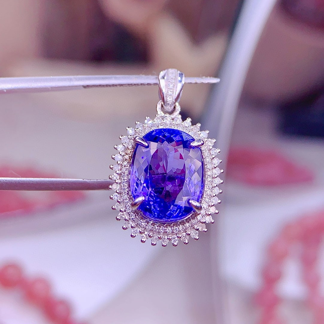 14k Gold 7.5 Ct Natural Tanzanite & Diamond Pendant( Without Chain ): Ref:231157066 // gold content:14k gold // main gemstone:tanzanite // shape:oval // carat weight:7. 5ct // color:blue // treatment:natural // // adjacent gemstone 2 : diamond // shape:round // clarity 
