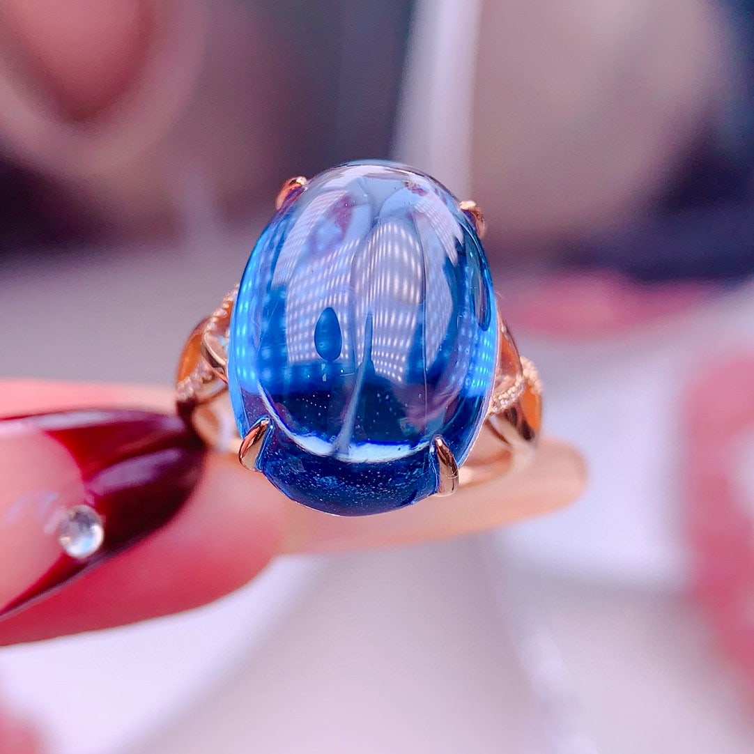 14k Gold 17.25 Ct Natural Topaz & Diamond Ring: Ref:231157099 // gold content:14k gold // ring size:7. 25us // // main gemstone:topaz // shape:oval // carat weight:17. 25ct // color:blue // treatment:natural // // adjacent gemstone 2 : diamond //