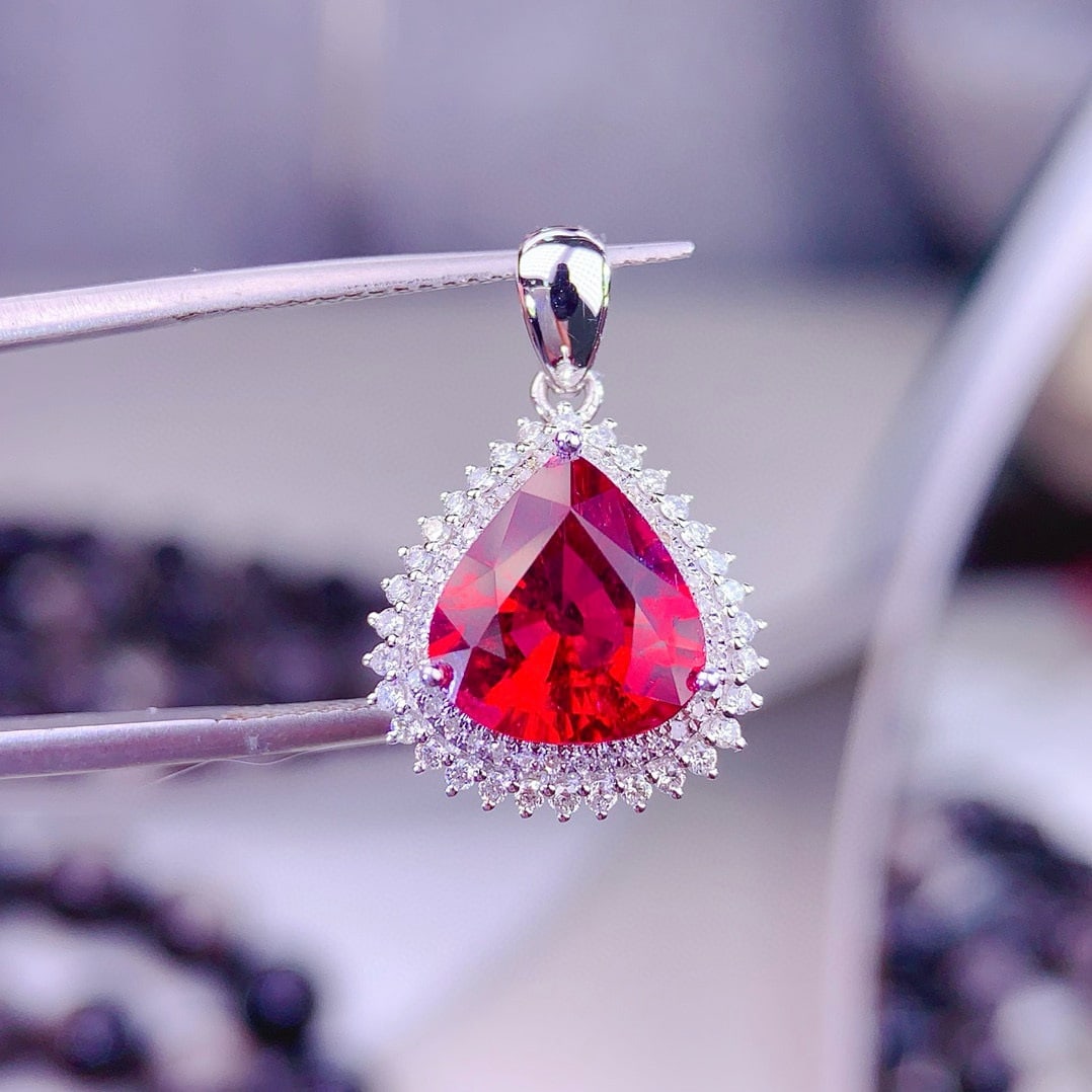 14k Gold 3.3 Ct Natural Tourmaline & Diamond Pendant( Without Chain ): Ref:231157109 // gold content:14k gold // main gemstone:tourmaline // shape:pear // carat weight:3. 3ct // color:rubellite // treatment:natural // // adjacent gemstone 2 : diamond // shape:round // cl
