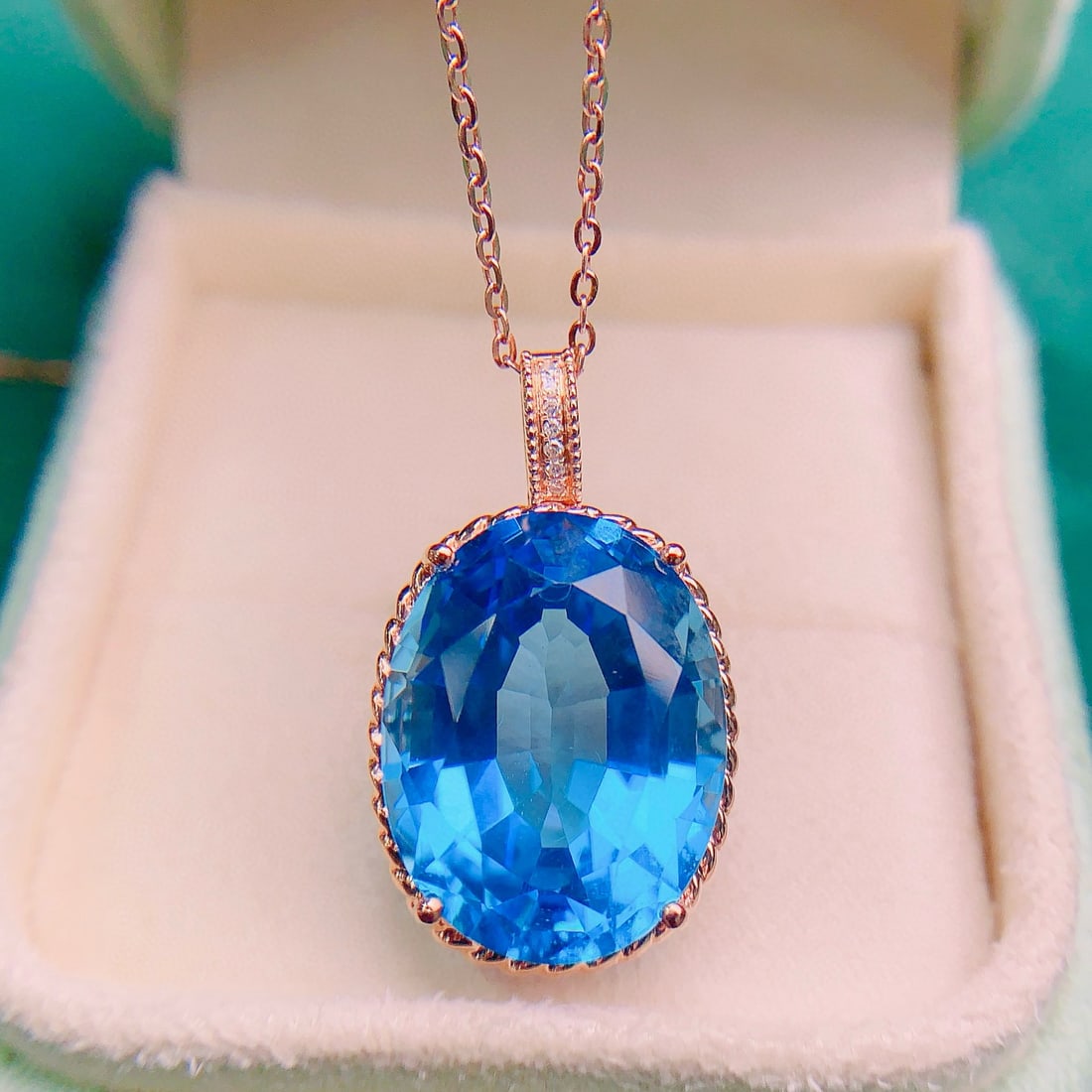 14k Gold 17.02 Ctw Natural Topaz & Diamond Pendant( Without Chain ): Ref:231157193 // gold content:14k gold // main gemstone:topaz // shape:oval // carat weight:17ct // color:blue // treatment:natural // // adjacent gemstone 2 : diamond // number of stones:7 //