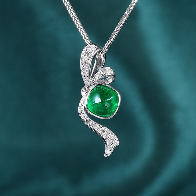 14k Gold 1.33 Ctw Natural Emerald & Diamond Pendant( Without Chain ): Ref:231158020 // gold content:14k gold // main gemstone:emerald // shape:sugar-loaf // carat weight:1. 2ct // color:green // treatment:natural // // adjacent gemstone 2 : diamond // number of stones:2