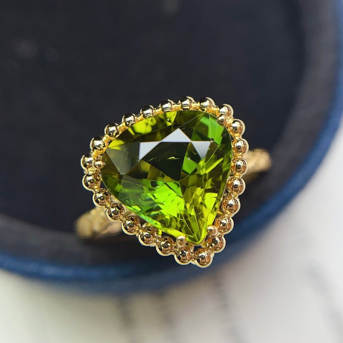 14k Gold 3.90 Ct Natural Tourmaline Ring: Ref:231158069 // gold content:14k gold // ring size:7. 25us // // main gemstone:tourmaline // shape:pear // carat weight:3. 90ct // color:green // treatment:natural // Condition: New Low Estimate: