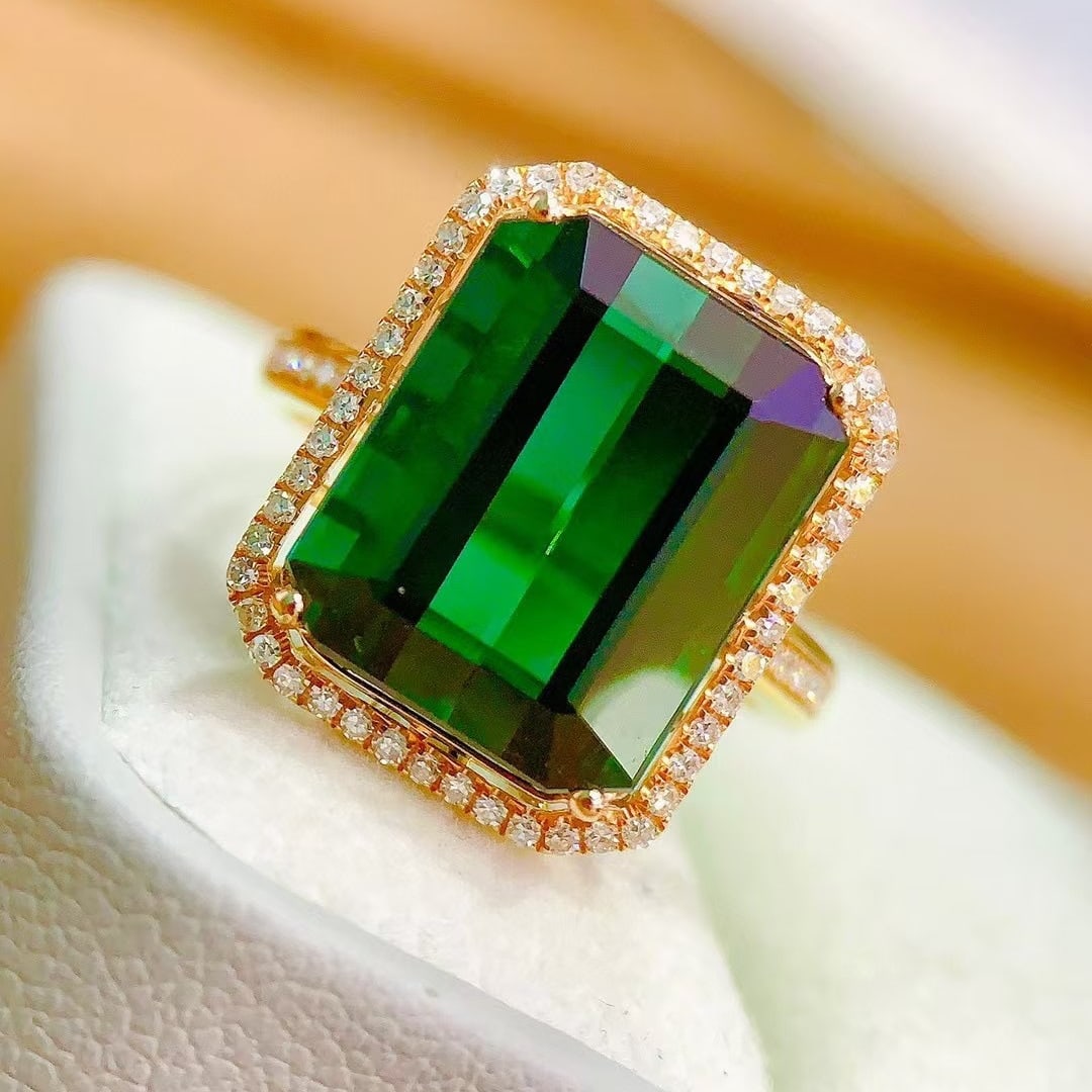 14k Gold 11.62 Ctw Natural Tourmaline & Diamond Ring: Ref:231158080 // gold content:14k gold // ring size:7. 25us // // main gemstone:tourmaline // shape:octagonal // carat weight:11. 3ct // color:green // treatment:natural // // adjacent gemstone 2 :