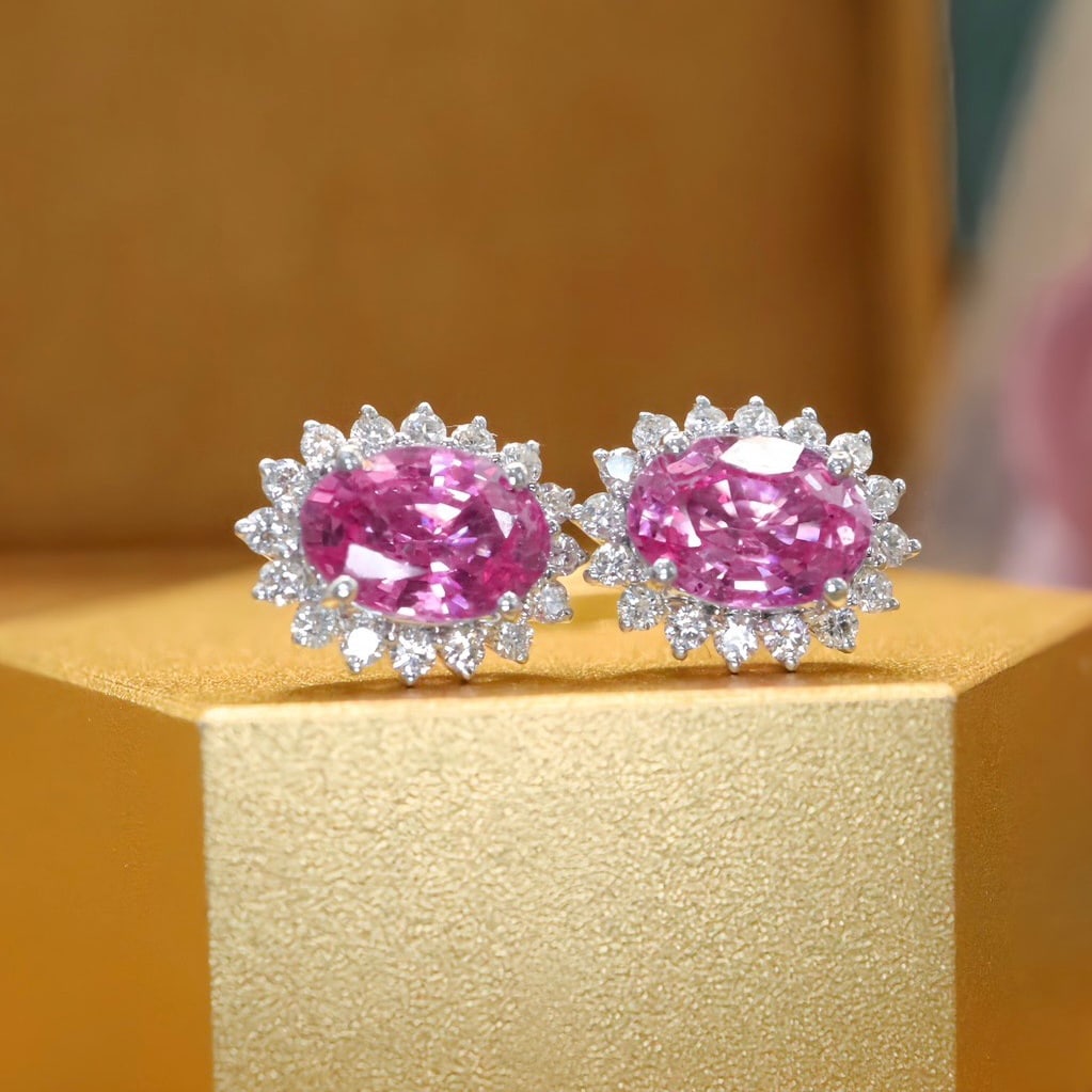 14k Gold 2.04 Ctw Natural Padparadscha Sapphire & Diamond Earrings: Ref:231158112 // gold content:14k gold // main gemstone:padparadscha sapphire // shape:oval // carat weight:1. 72ct // color:orangish pink // treatment:natural // // adjacent gemstone 2 : diamond //