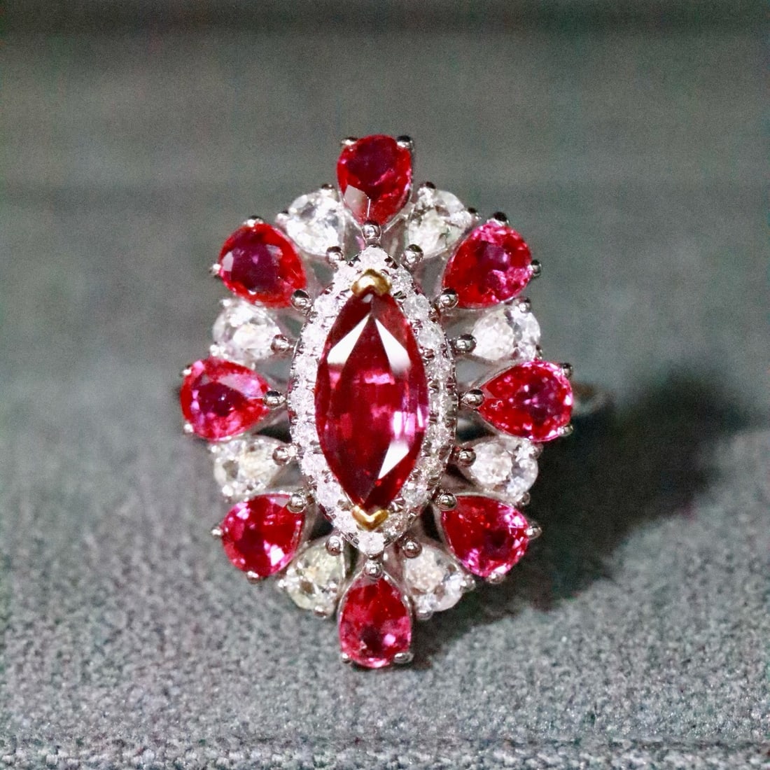 14k Gold 0.86 Ctw Natural Ruby & Diamond Ring: Ref:231158298 // gold content:14k gold // ring size:7. 25us // // main gemstone:ruby // shape:marquise // carat weight:0. 76ct // color:red // treatment:natural // // adjacent gemstone 2 : diamond // 