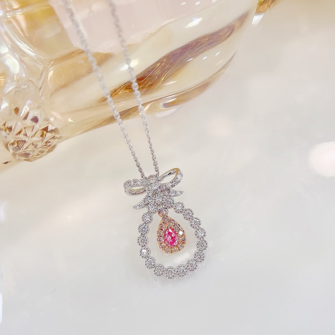 14k Gold 0.33 Ctw Natural Pink Diamond & Diamond Necklace: Ref:231158313 // gold content:14k gold // main gemstone:pink diamond // shape:pear // carat weight:0. 09ct // color:pink // treatment:natural // // adjacent gemstone 2 : diamond // shape:round // cara