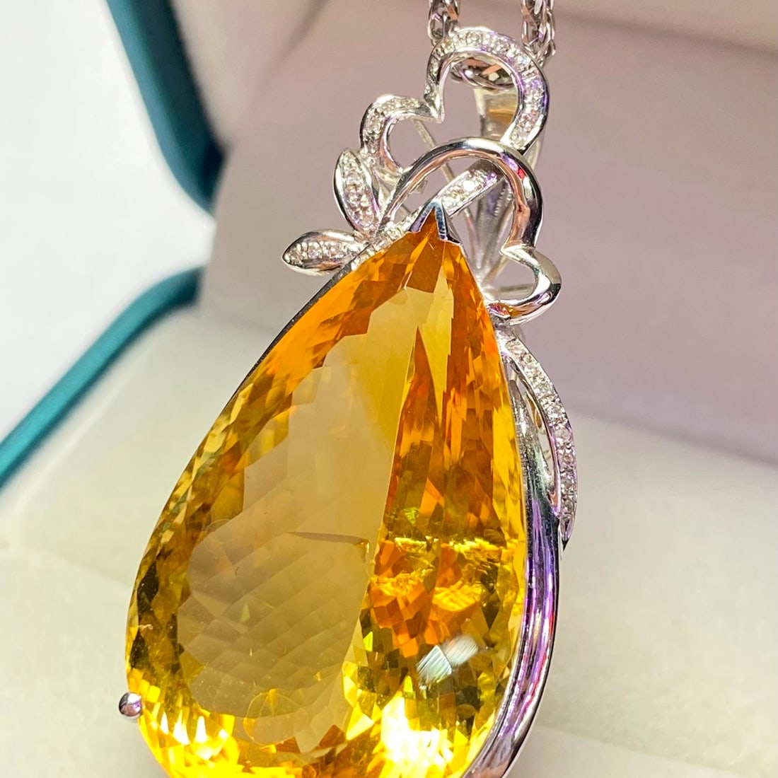 14k Gold 44.60 Ct Natural Citrine & Diamond Pendant( Without Chain ): Ref:231158353 // gold content:14k gold // main gemstone:citrine // shape:pear // carat weight:44. 60ct // color:yellow // treatment:natural // // adjacent gemstone 2 : diamond // number of stones:34 /