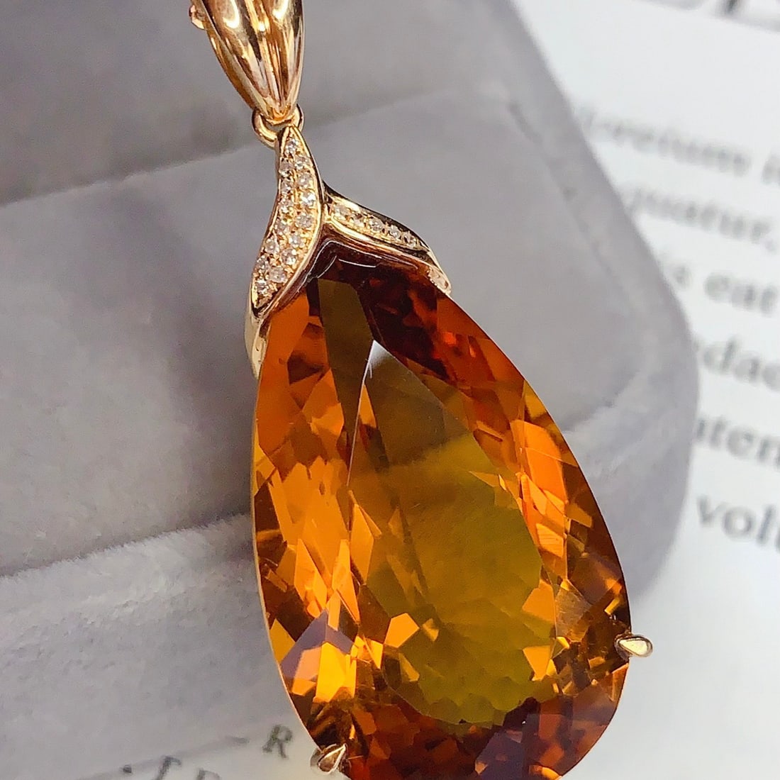 14k Gold 25.85 Ct Natural Citrine & Diamond Pendant( Without Chain ): Ref:231158366 // gold content:14k gold // main gemstone:citrine // shape:pear // carat weight:25. 85ct // color:yellow // treatment:natural // // adjacent gemstone 2 : diamond // number of stones:20 /