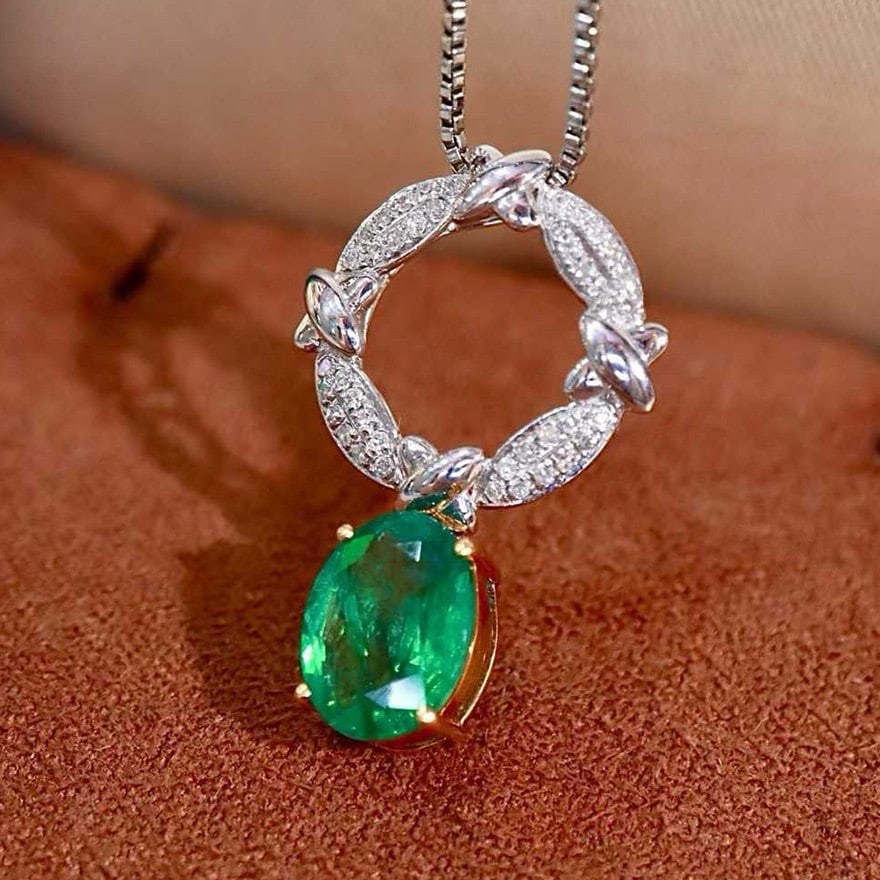 14k Gold 2.06 Ctw Natural Emerald & Diamond Pendant( Without Chain ): Ref:231158383 // gold content:14k gold // main gemstone:emerald // shape:oval // carat weight:1. 90ct // color:green // treatment:natural // // adjacent gemstone 2 : diamond // shape:round // carat
