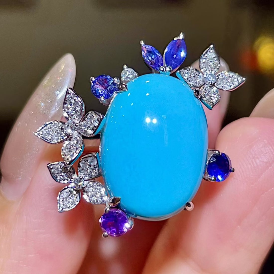 14k Gold 11.95 Ctw Natural Blue Turquoise & Sapphire Ring: Ref:231158400 // gold content:14k gold // ring size:7. 25us // // main gemstone:blue turquoise // shape:oval // carat weight:11. 10ct // color:blue // treatment:natural // // adjacent gemstone 2 :
