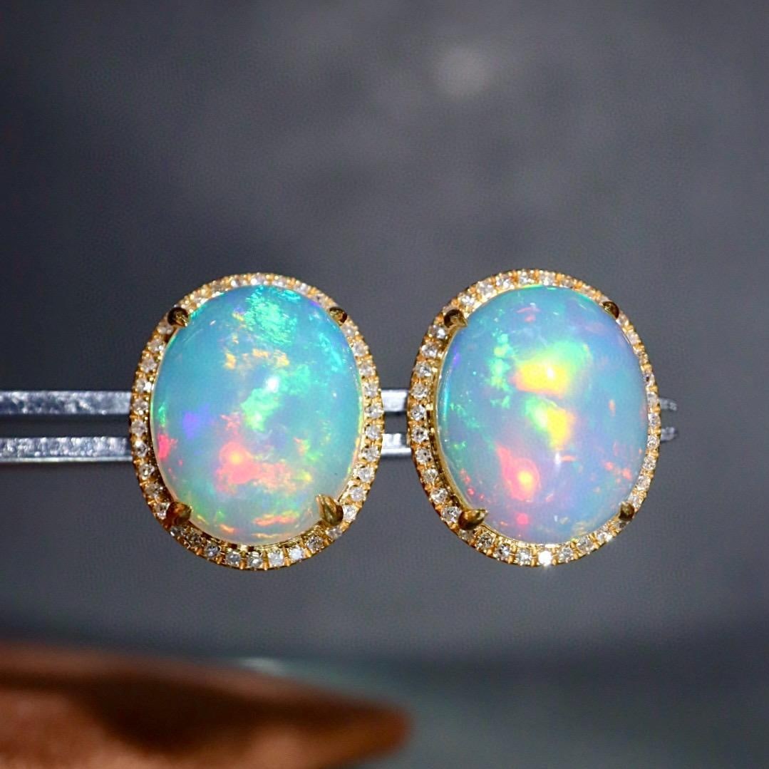 14k Gold 5.03 Ctw Natural Opal & Diamond Earrings: Ref:231159085 // gold content:14k gold // main gemstone:opal // shape:oval // carat weight:4. 8ct // color:color // treatment:natural // // adjacent gemstone 2 : diamond // shape:round // carat