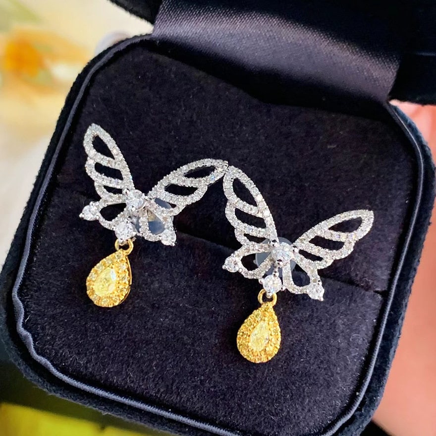 14k Gold 0.9 Ct Natural Color Diamond & Butterfly Earrings: Ref:231159182 // gold content:14k gold // main gemstone:diamond // shape:multiple // carat weight:0. 9ct // clarity grade:vs-si // color:color // treatment:natural // Condition: New Low Estimate: