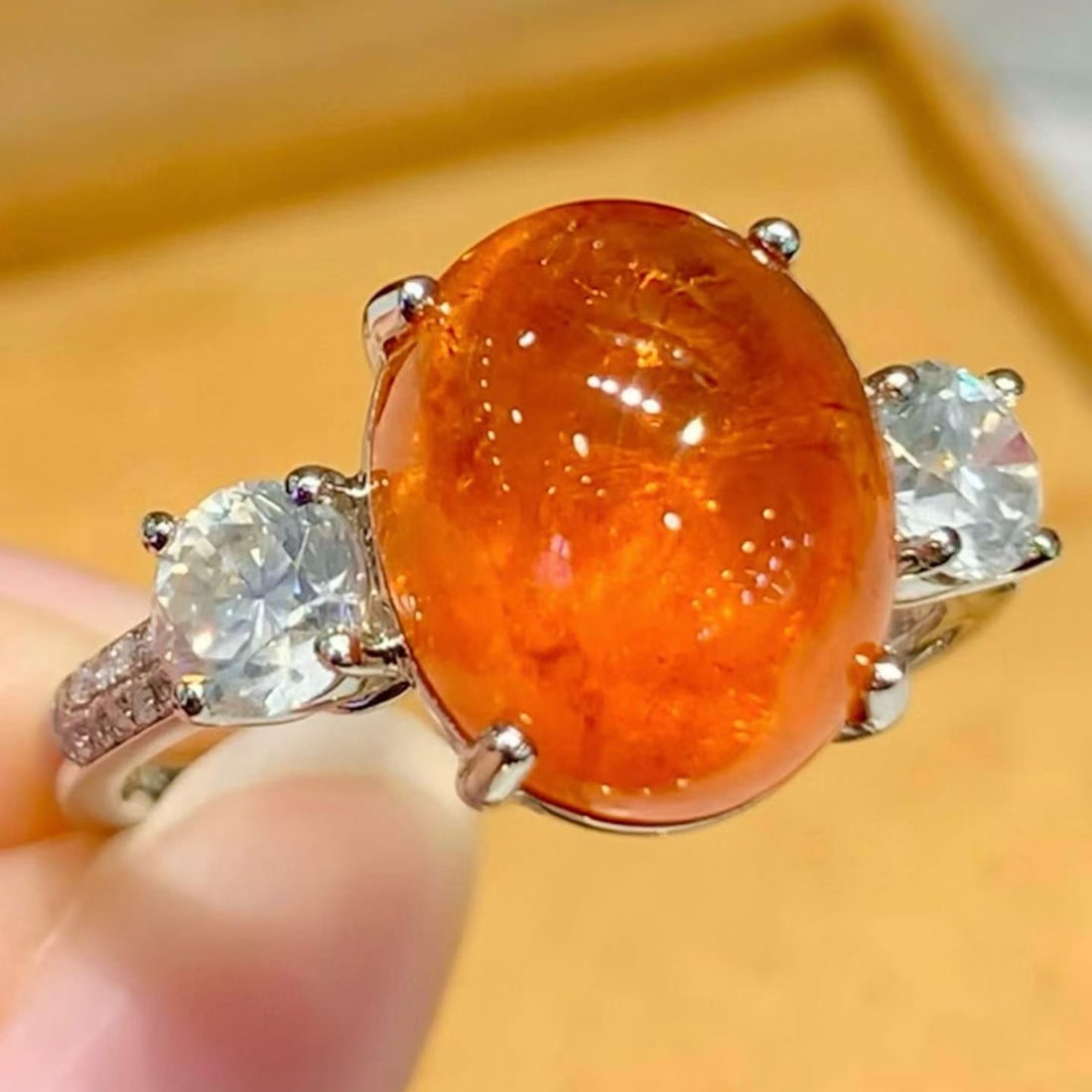 14k Gold 8.2 Ctw Natural Spessartine & Diamond Ring: Ref:231160065 // gold content:14k gold // ring size:7. 25us // // main gemstone:spessartine // shape:oval // carat weight:7. 5ct // color:orange // treatment:natural // // adjacent gemstone 2 : diamon