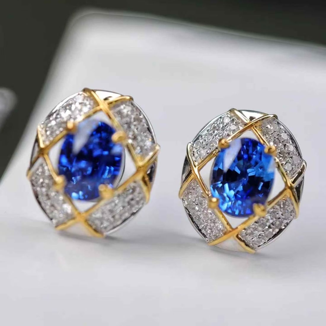 14k Gold 1.67 Ctw Natural Sapphire & Diamond Earrings: Ref:231160126 // gold content:14k gold // main gemstone:sapphire // shape:oval // carat weight:1. 48ct // color:blue // treatment:natural // // adjacent gemstone 2 : diamond // shape:round // carat