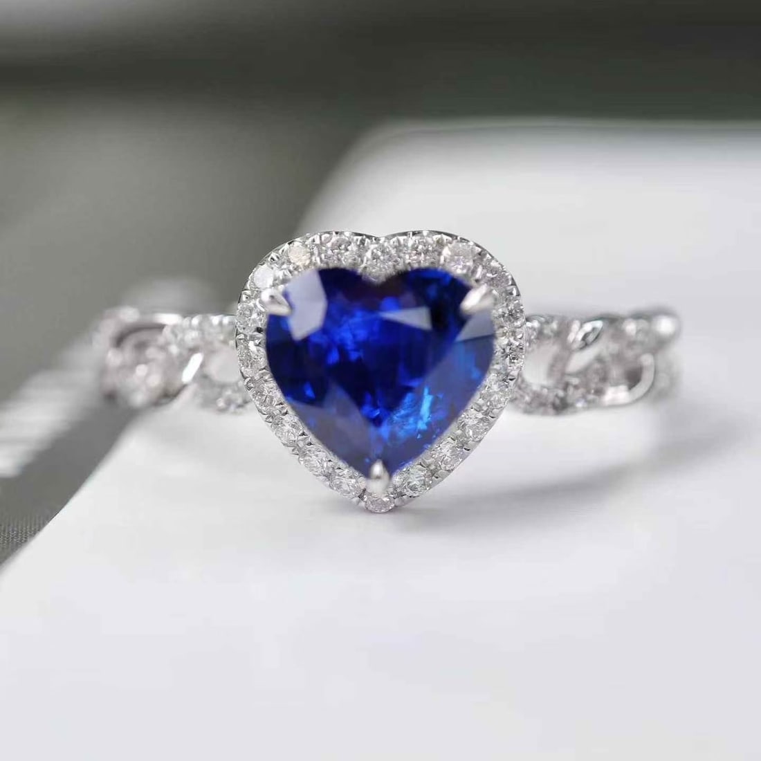 14k Gold 1.22 Ctw Natural Sapphire & Diamond Ring: Ref:231160129 // gold content:14k gold // ring size:7. 25us // // main gemstone:sapphire // shape:heart // carat weight:1. 03ct // color:royal blue // treatment:natural // // adjacent gemstone 2 :