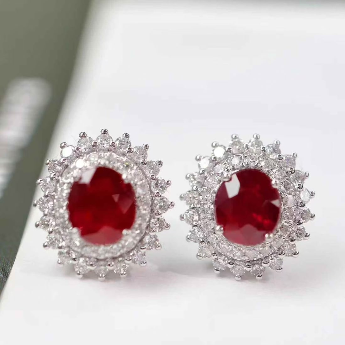 14k Gold 1.90 Ctw Natural Ruby & Diamond Earrings: Ref:231160170 // gold content:14k gold // main gemstone:ruby // shape:oval // carat weight:1. 1ct // color:pigeonblood red // treatment:natural // // adjacent gemstone 2 : diamond // shape:round //