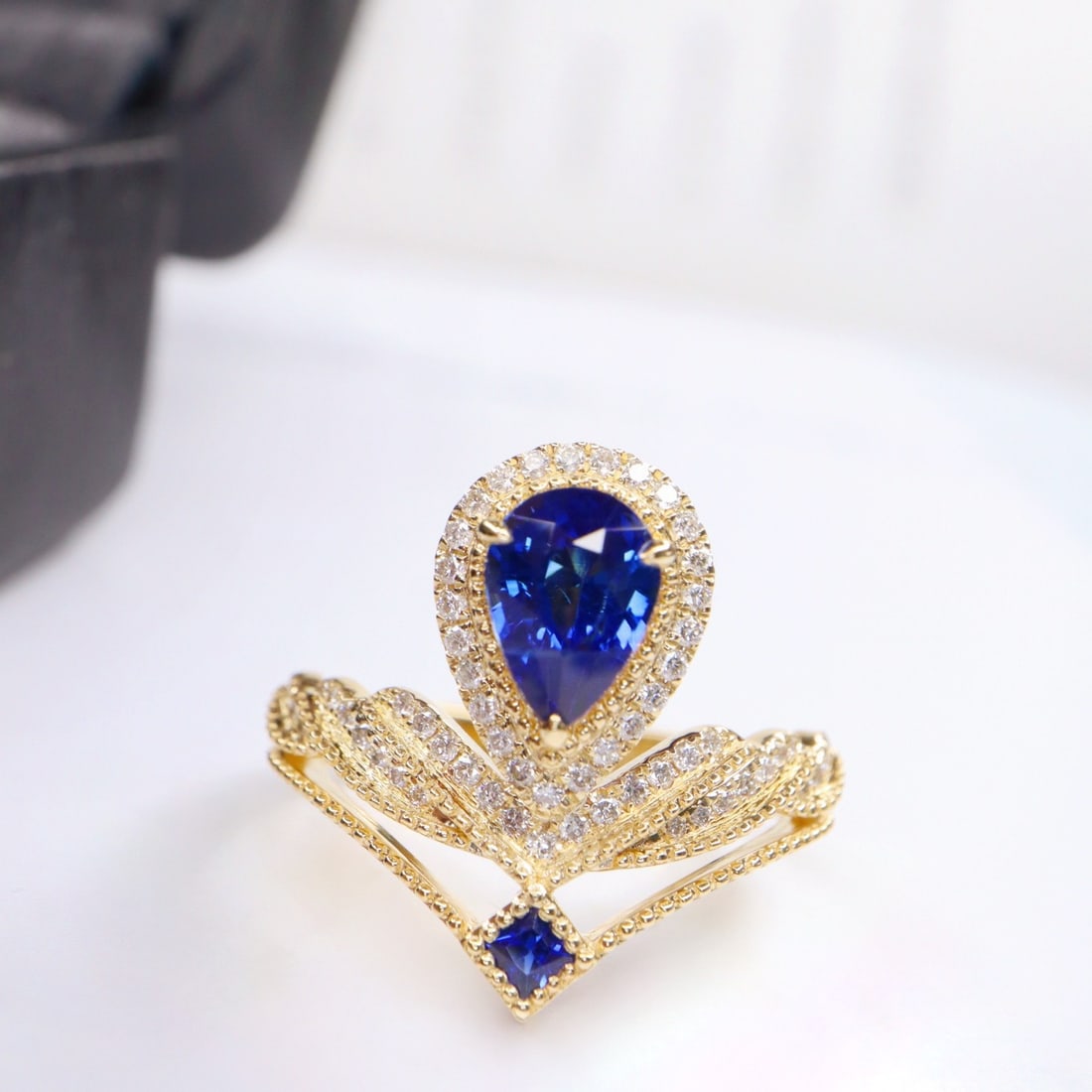 14k Gold 1.63 Ctw Natural Sapphire & Diamond Ring: Ref:231160266 // gold content:14k gold // ring size:7. 25us // // main gemstone:sapphire // shape:pear // carat weight:1. 36ct // color:royal blue // treatment:natural // // adjacent gemstone 2 :