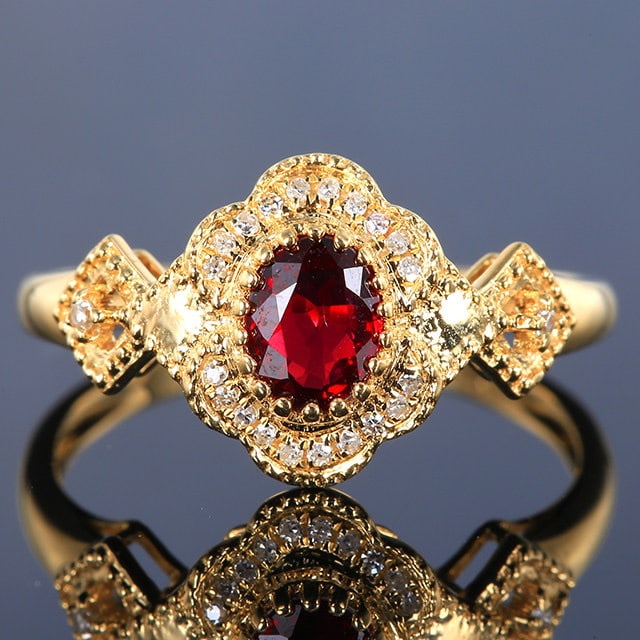14k Gold 0.62 Ctw Natural Ruby & Diamond Ring: Ref:231160389 // gold content:14k gold // ring size:7. 25us // // main gemstone:ruby // shape:oval // carat weight:0. 55ct // color:red // treatment:natural // // adjacent gemstone 2 : diamond //