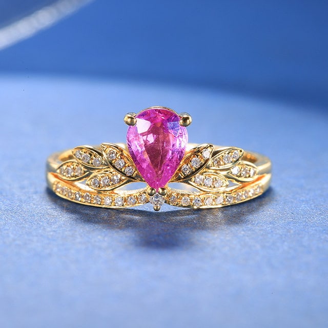 14k Gold 1.09 Ctw Natural Sapphire & Diamond Ring: Ref:231160391 // gold content:14k gold // ring size:7. 25us // // main gemstone:sapphire // shape:pear // carat weight:0. 95ct // color:pink // treatment:natural // // adjacent gemstone 2 : diamond